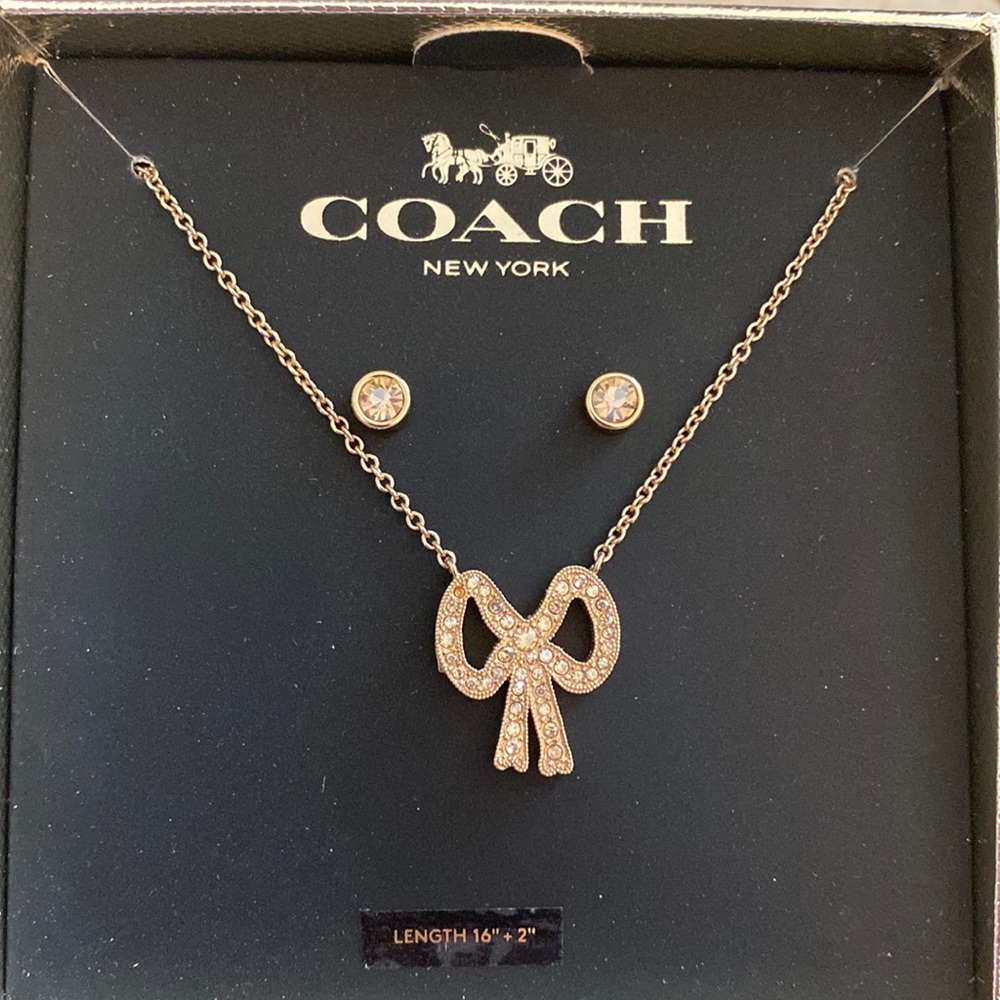 Coach champagne color bow and studs